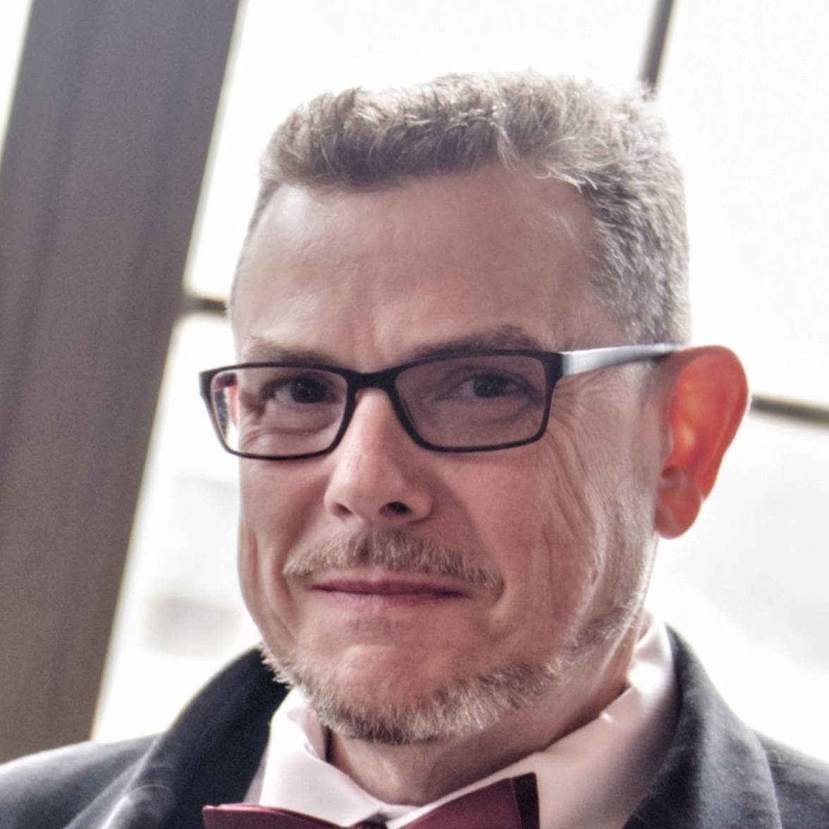 JON E. KOLB
