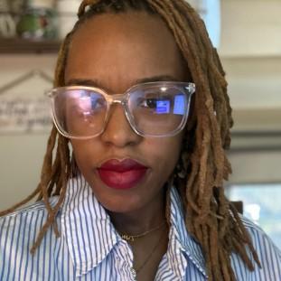 TANISHA A. DAMBREVILLE-PIERRE