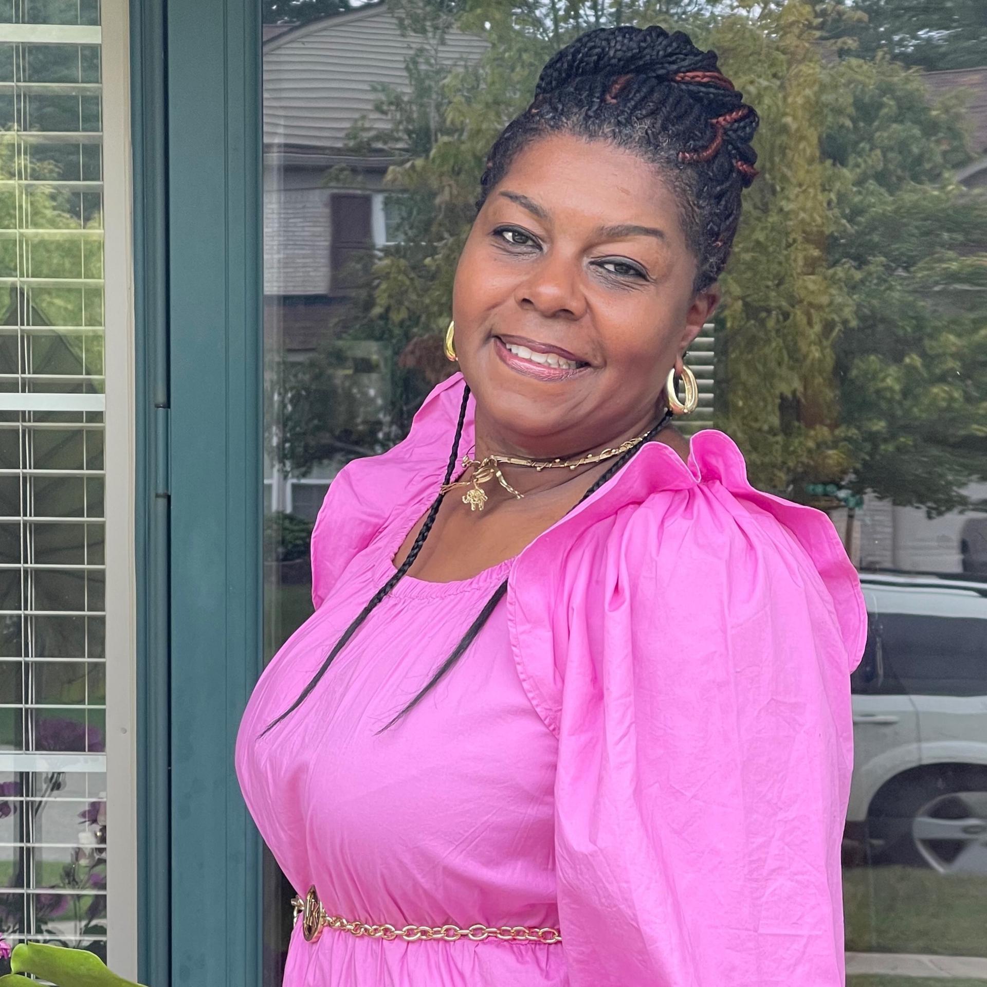 ARETHA M. SNADON